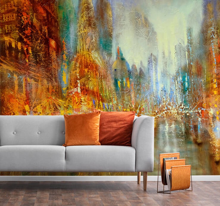 orange and red abstract city wallpaper with grey couch