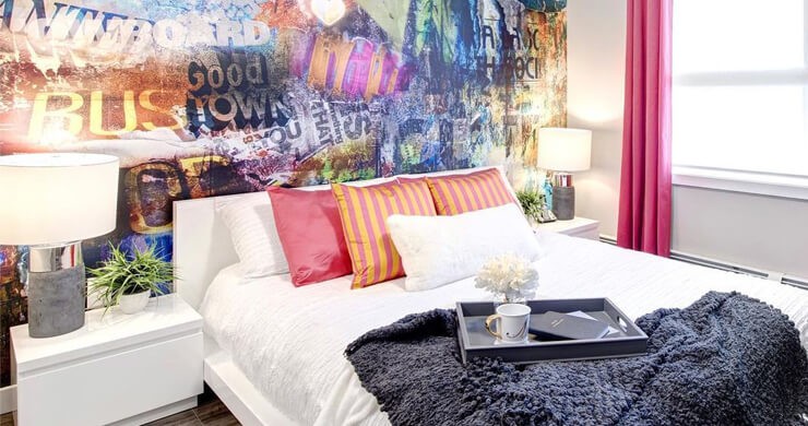 colourful graffiti wallpaper in stylish bedroom