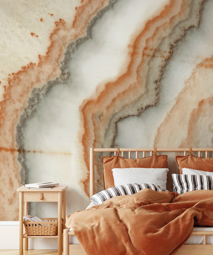 orange marble effect wallpaper in terracotta bedroom