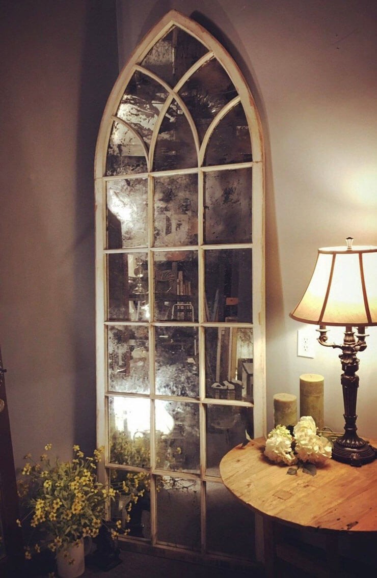 Gothic style arched mirror in a hallway