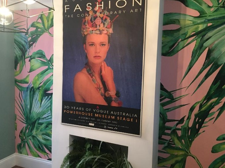tropical leaf with pink background in fashionista styled room