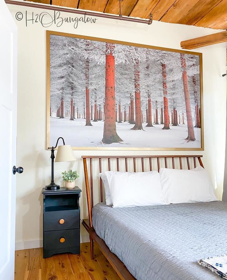 snow forest wallpaper in scandi bedroom