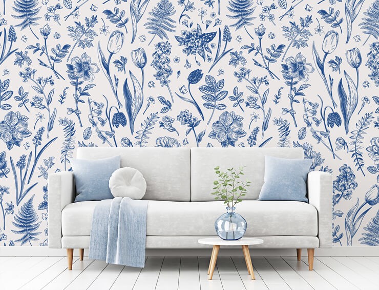 papel de parede de flores azuis e brancas na sala de estar branca e azul