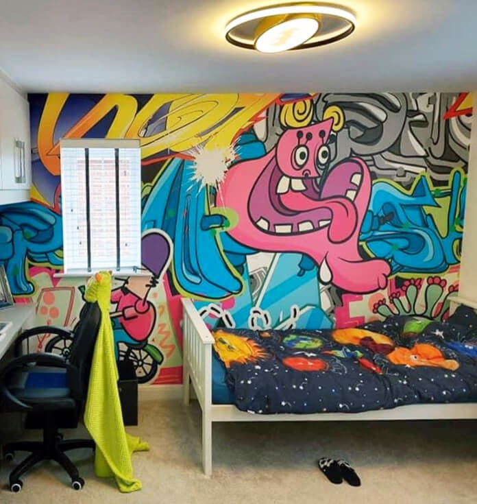 colourful graffiti wall mural in kids bedroom