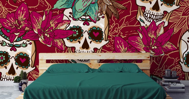 pink and teal day of the dead flowers and skulls wallpaper in trendy bedroom 