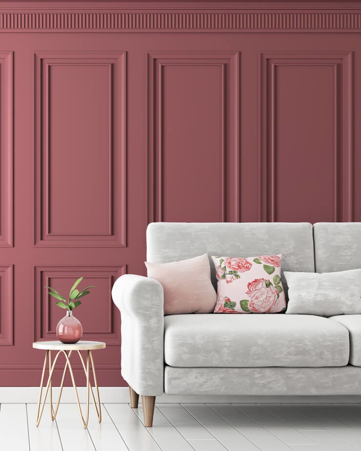 pink wall panelling with neutral furniture