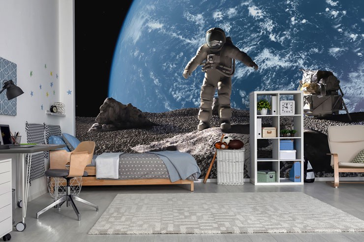 cool astronaut wallpaper in boy's trendy bedroom