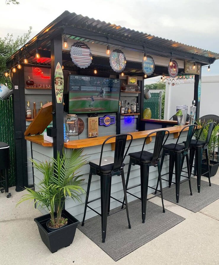 black outdoor bar with tv
