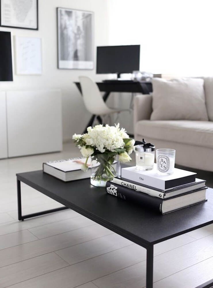 Grey living room with a cool grey sofa and matt black coffee table
