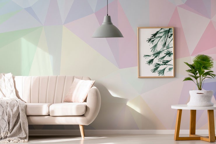 pastel pink purples and cream geometric wallpaper in modern lounge