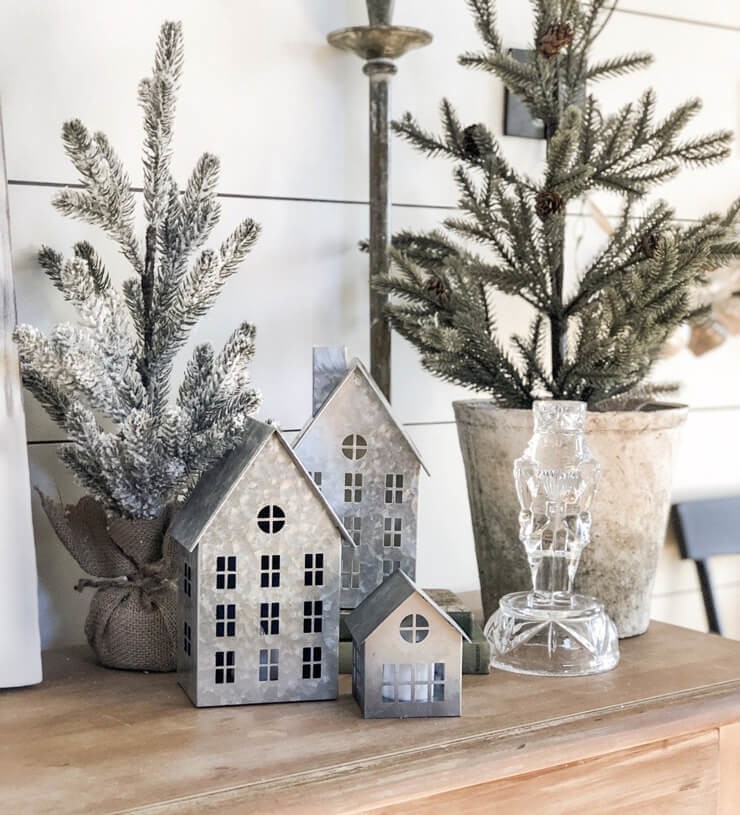 tin candle houses and silver decor