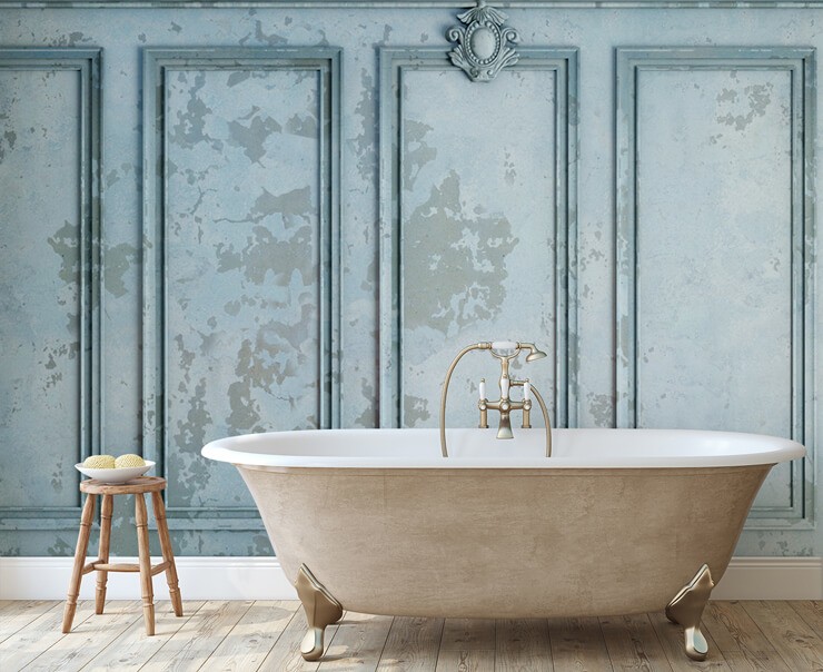 antique duck egg blue panel wallpaper in bathroom with gold tub