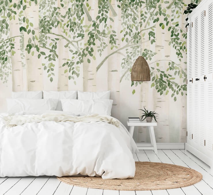 Forest green mural in a cream themed bedroom