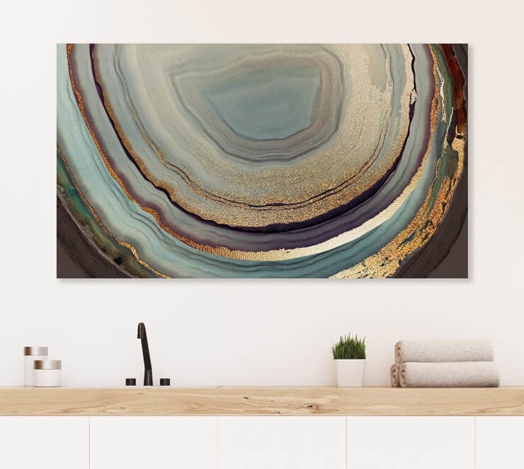gold and purple coloured metal print in bathroom