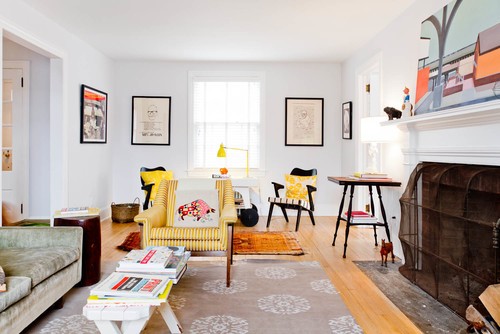use rugs to create separate areas in a small room