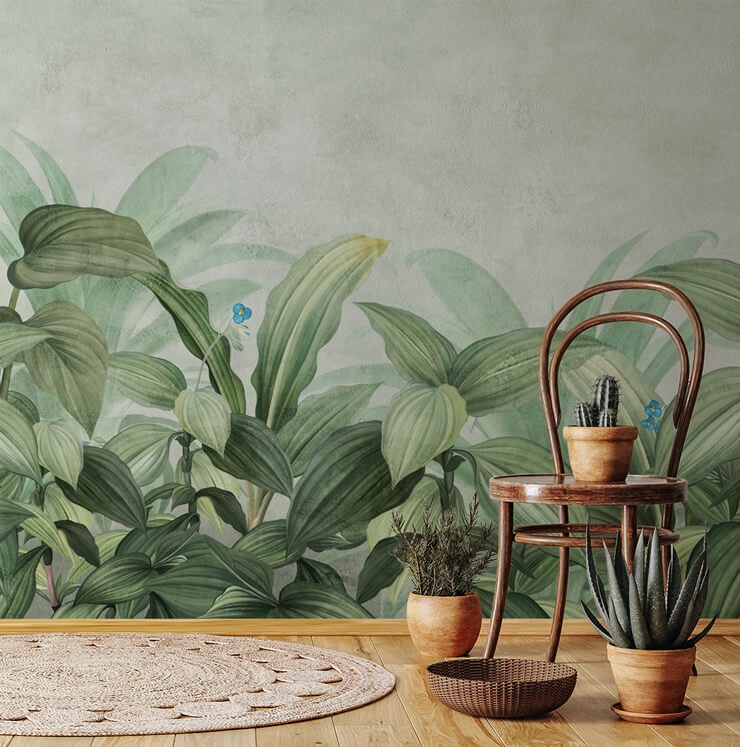 vintage style green leaves wallpaper in room with chair and potted tropical plants