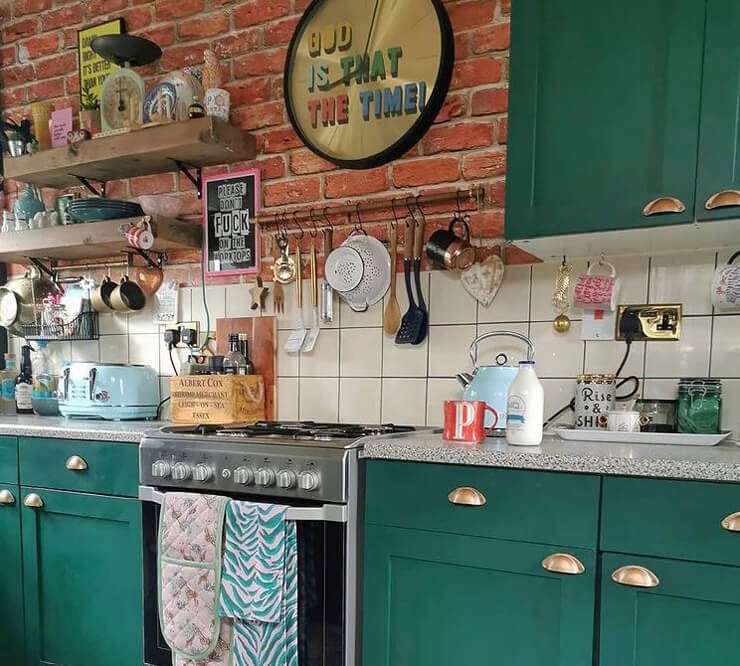 faux red brick wallpaper in kitchen with shelves
