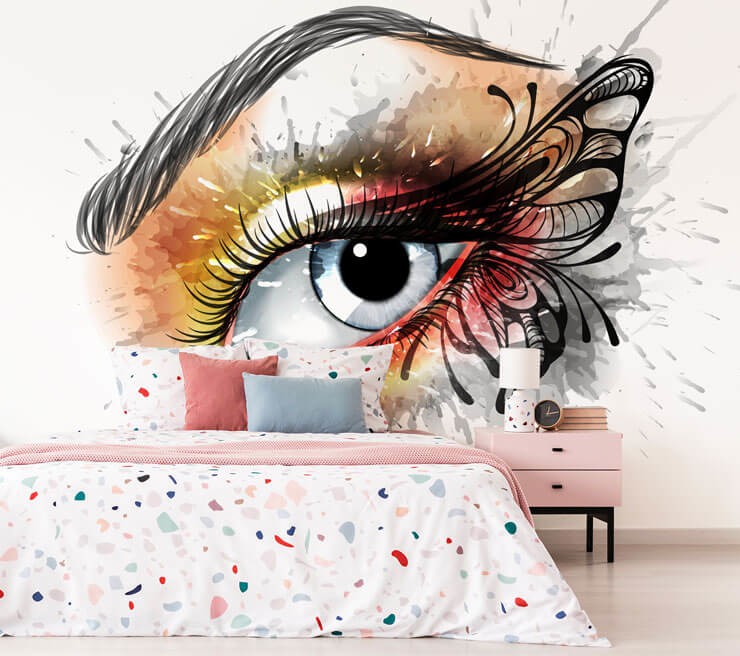 delicate female butterfly eye tattoo wallpaper in bedroom with terrazzo patterned bed