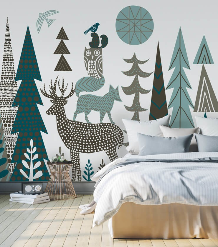 Blue and green Christmas wallpaper in a bedroom with white bedsheets