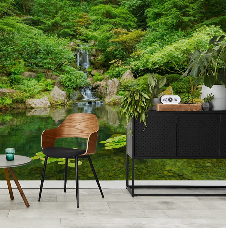 japanese pond scenery wallpaper in seating area with lots of green plants