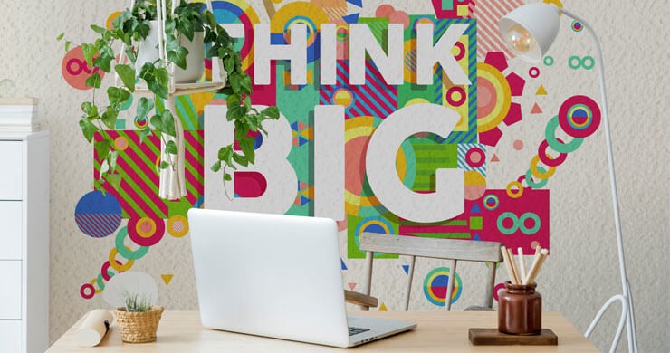 colourful think big quote wallpaper in trendy office